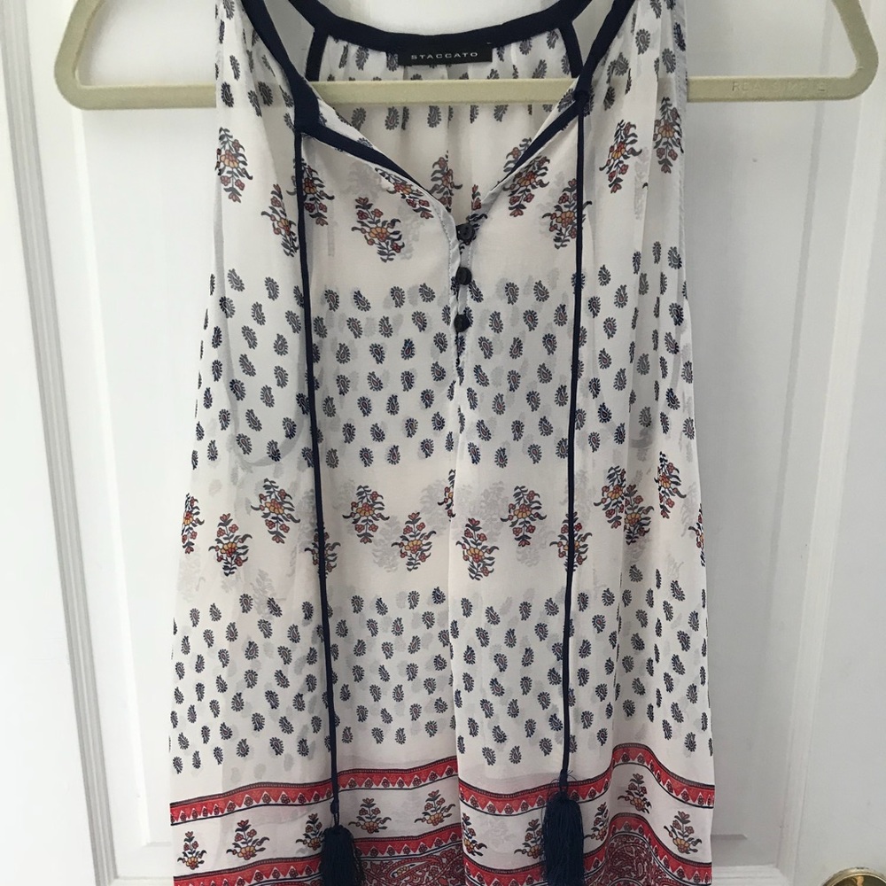 Beautiful pattern blouse with tassel detail